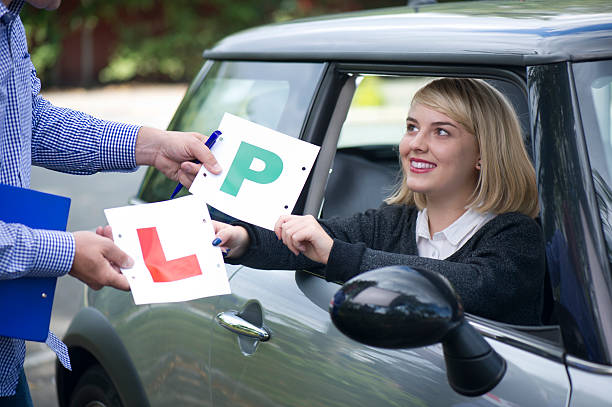handing over P plate
